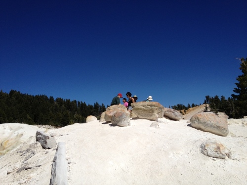 Our gang, looking down at Bumpass Hell, geothermal area below, with water that steams and bubbles at over 200 degrees f. 